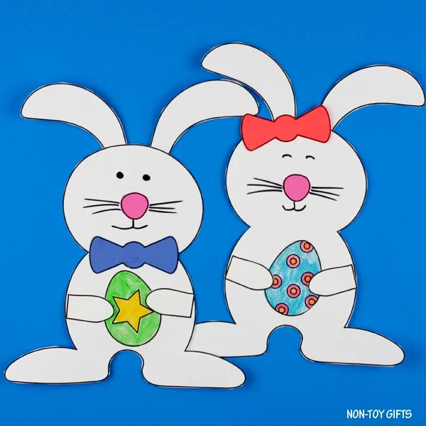 Boy and girl bunny with Easter egg