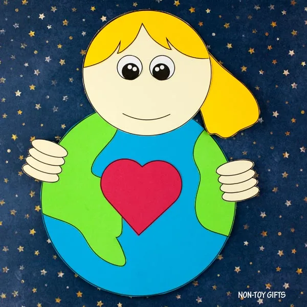 girl holding our Earth craft