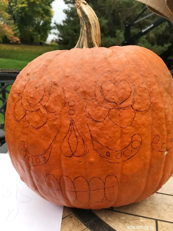 marker on pumpkin
