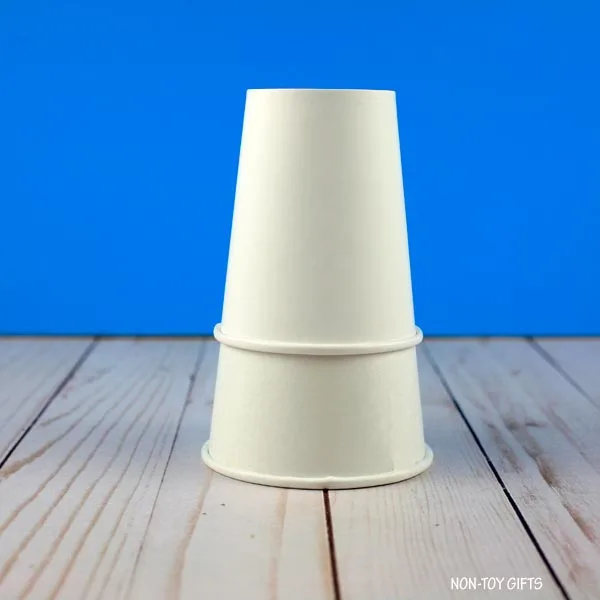 two paper cups stacked one on top of the other