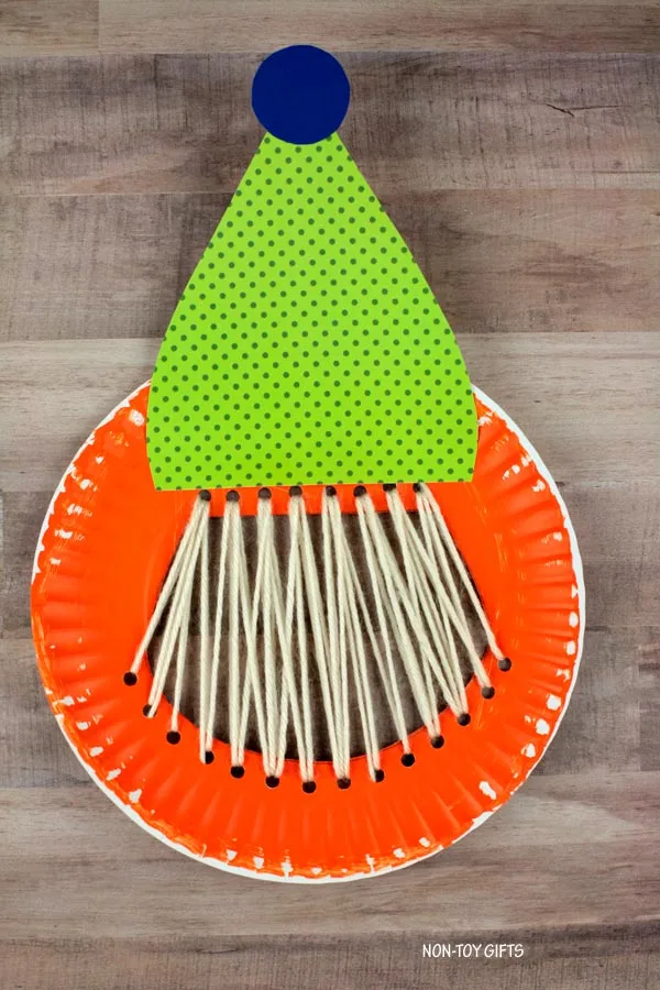 hat glued onto paper plate