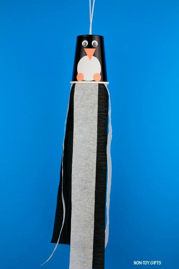 Paper cup penguin windsocks craft for kids