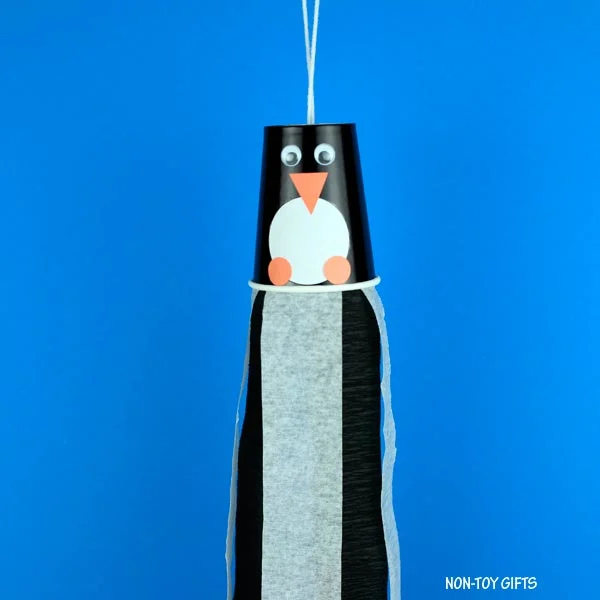Paper cup penguin windsocks craft for toddlers, preschoolers and older kids