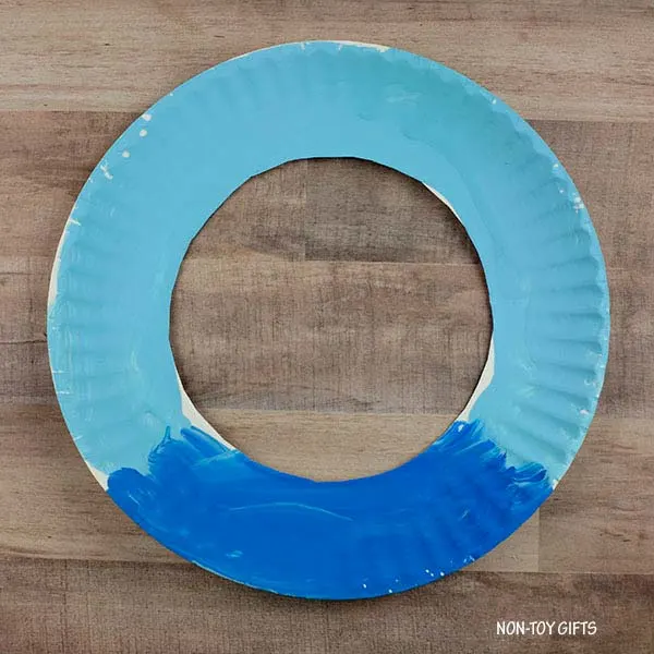 cut the middle of the paper plate