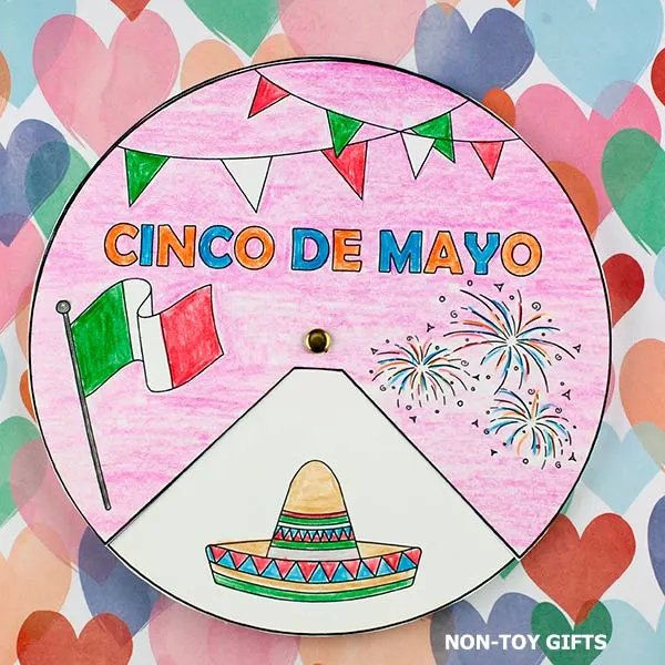 Cinco de Mayo spinner craft with Mexican symbols: sombrero, cactus, maracas and guitar