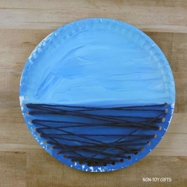 paper plate and yarn