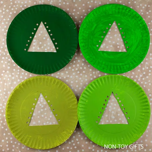 make holes along the sides of the triangle