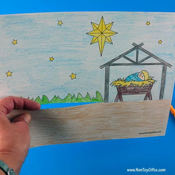 Use a craft knife to cut along the dotted line.