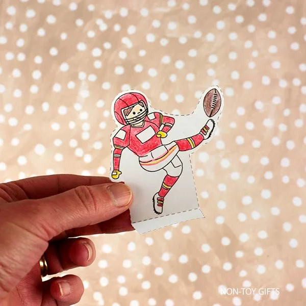 fold the bottom of the football player