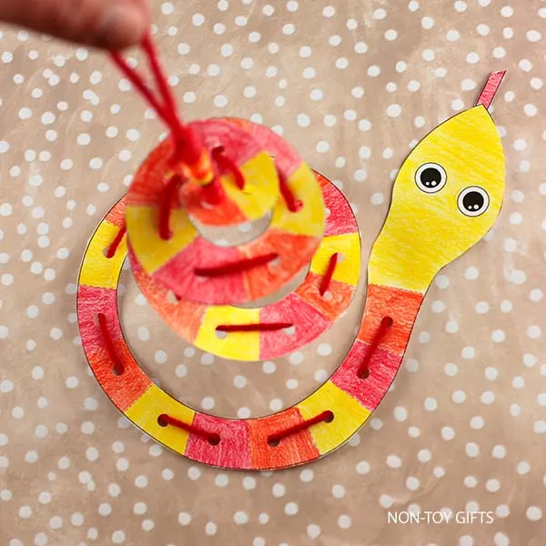 spiral snake craft printable for kids to make for the Year of the Snake