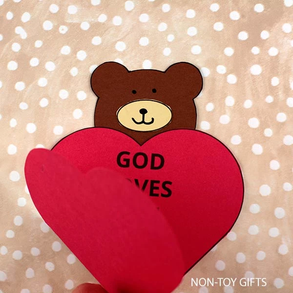 glue the head onto the folded heart