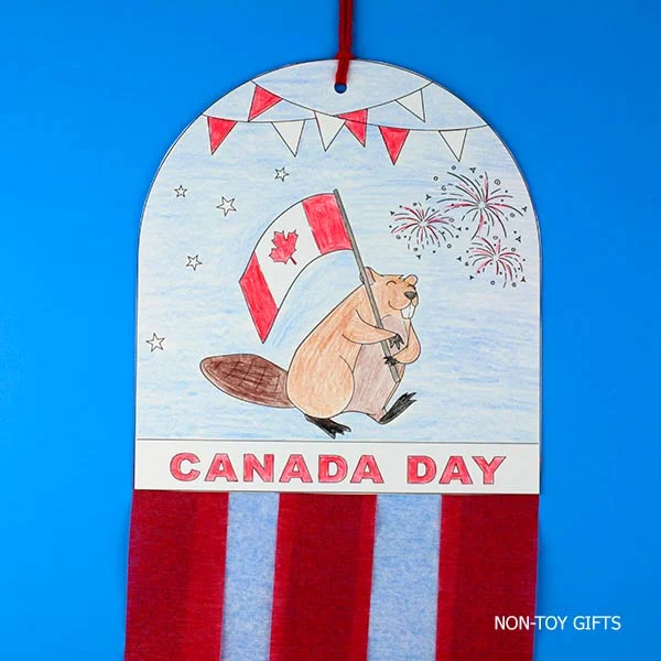 Easy Canada Day craft featuring a beaver carrying the Canadian flag