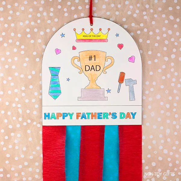 Father's Day decoration craft printable featuring king of the day crown and a #1 dad trophy