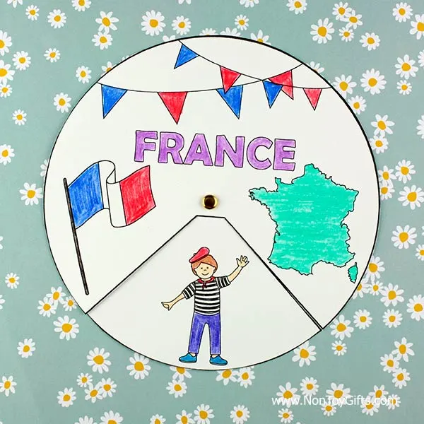 France spinner craft printable with boy in striped t-shirt, red tie and beret