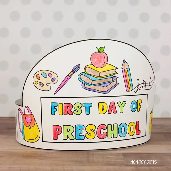 DIY paper hat printable with preschool-themed images to color and assemble