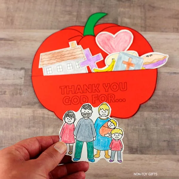insert the thankful items inside the pumpkin pocket